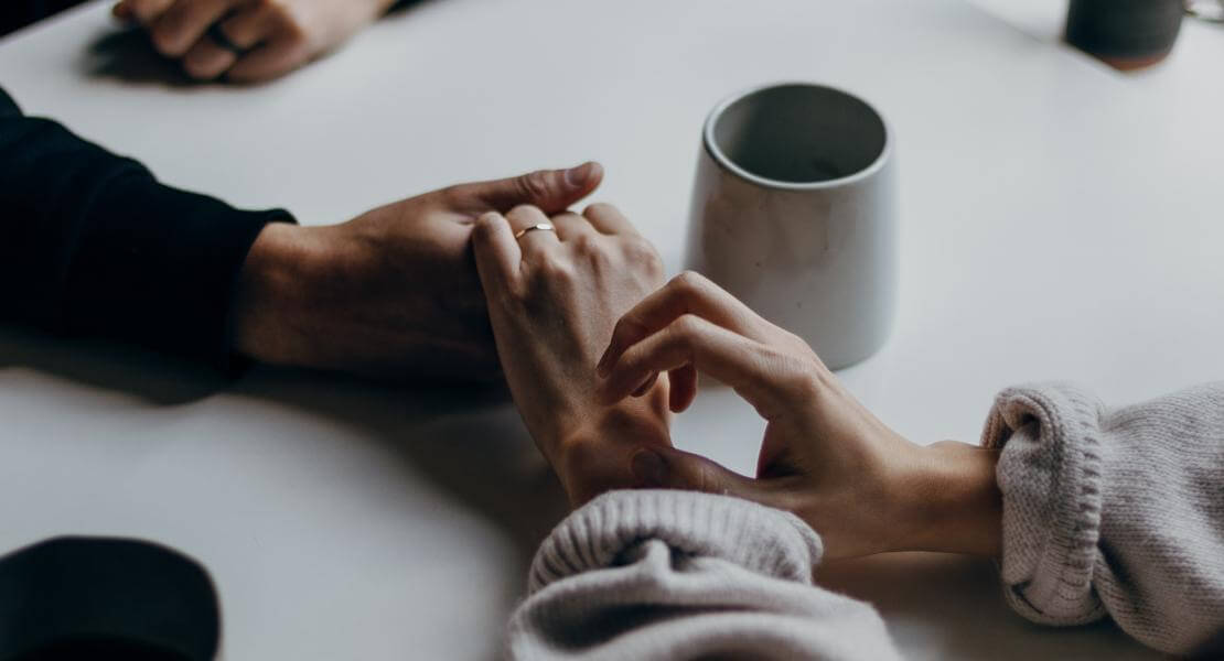 couple holding hands